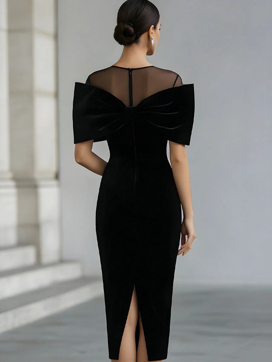 Regina | Robe midi en velours noir avec un nœud spectaculaire