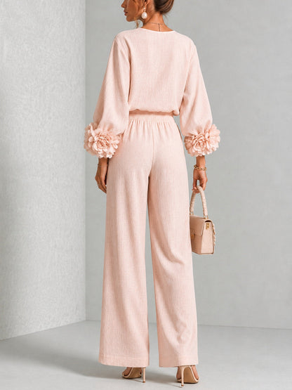 ROSALIE | ENSEMBLE DEUX PIÈCES AVEC MANCHETTES À MOTIFS FLORAUX.