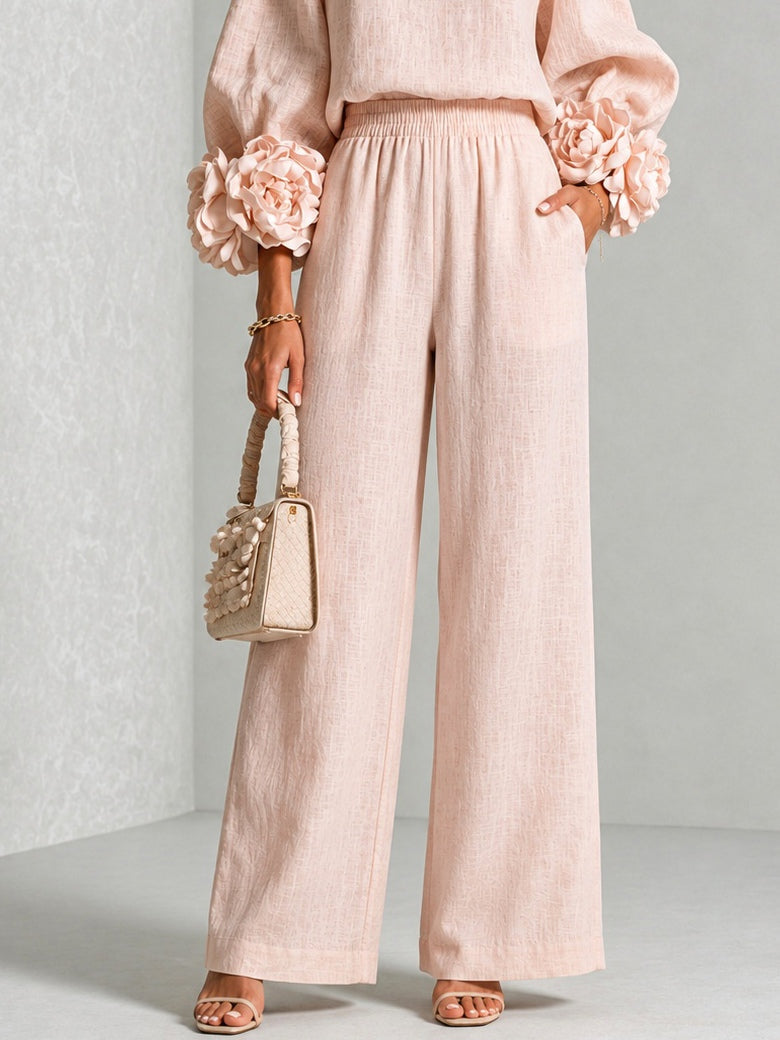 ROSALIE | ENSEMBLE DEUX PIÈCES AVEC MANCHETTES À MOTIFS FLORAUX.